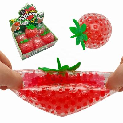 China Stress Ball Simulation Fruit Strawberry Squeeze Fruit Toys Jelly Bead Gel Balls Filled Strawberry Expandable Stress Ball for sale