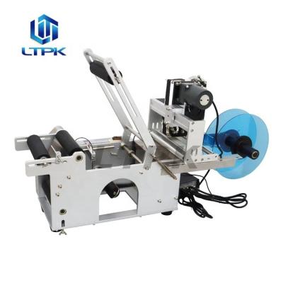 China LT-50D small food plastic round bottle barcode adhesive label printing machine roll sticker printer for sale