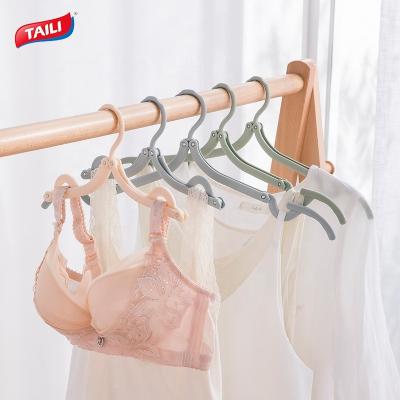 China 8 Pcs Space Saver Multifunctional Plastic Storage Hanger Traditional Hanging Moving Clothes Folding Hanger for sale