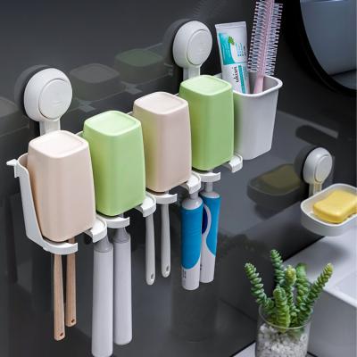 China 2021 New Bathroom Durable Removable Powerful Wall Mount Plastic Suction Cup Toothbrush Holder With Cups for sale