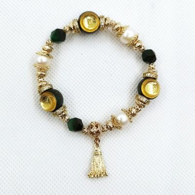 China Natural Crystal Precious Metal Tiger Resin India Green Stone Orgonite & Bracelets for sale