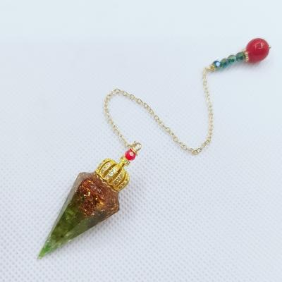 China Ancient Egypt Gold Metal Pendant Energy Sophisticated Design Resin and Orgonite Reiki Crystal Pendulum for sale