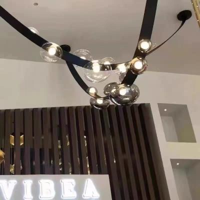 China Large Modern Luxury Leather Decorative Artistic Pendant Light Ceiling Hotel Lobby Hanging Lamp Led Nordic Modern Glass Chandelier for sale