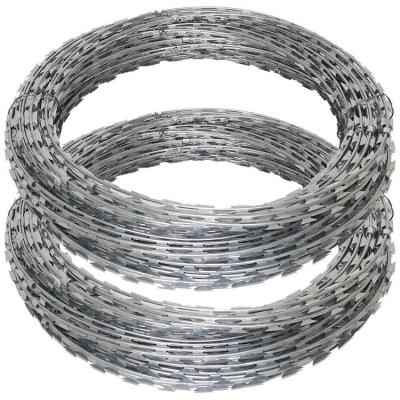 China Government Buildings and Anti Grazing Boundary Climb Barrier Razor Wire Security BTO-12 Razor Blade Wire Concertina Hot Dipped Galvanized Coils for sale