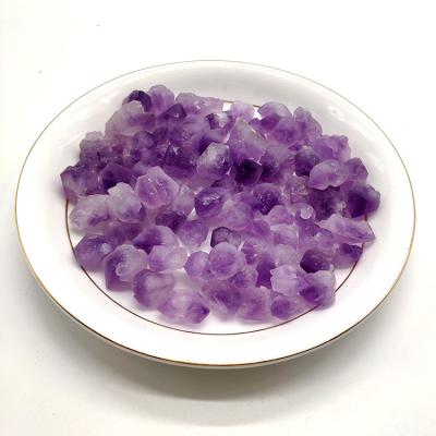 China Beautiful China Mineral Buyers Small Crystal Amethyst Tumbled Stone for sale