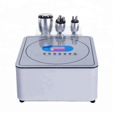 China Weight Loss 3 in 1 Portable 40K Cavitation Machine Photon RF Slim Fat Burning Body Face Lift Device for sale