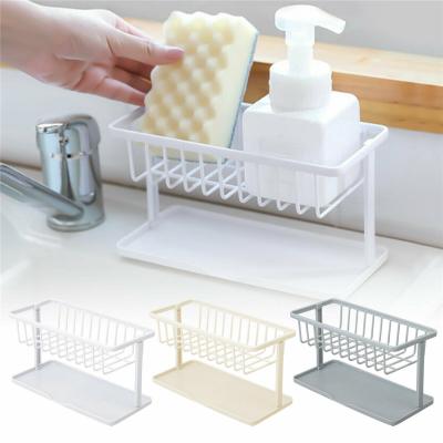 China Viable Kitchen Storage Drain Basket Soap Sponge Holder Sink Drain Shelf Storage Basket for sale