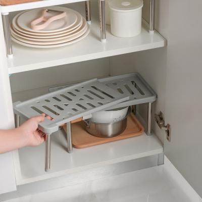 China Multi-Function Kitchen Vintage Kitchen Supplies Household Multi-Layer Stainless Steel Telescopic Storage Rack for sale