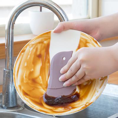 China Viable Cute Penguin Shape Soft Dish Oil Scraper Blade Kitchen Instrument Baking Scratch Dirty Stains Wiping Board for sale