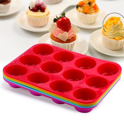 China Sustainable Non-Stick Food Grade Round 12 Cup Silicone Muffin Pan Baking Cake Mold for sale