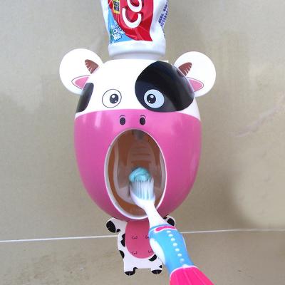 China Modern Children's Automatic Toothpaste Squeeze Bathroom Toothpaste Dispenser Wall Mount Plastic Bracket for sale