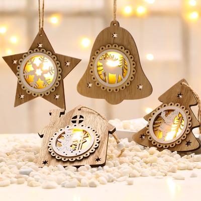 China Chimera Holiday Decorate New 2021 Christmas Decoration Creative Cavity Christmas Wood Chandelier With Lights for sale