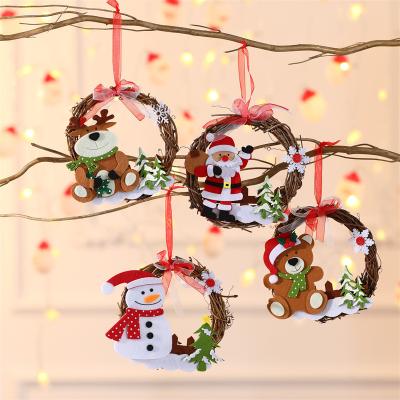 China Rattan Hanging Santa Christmas Tree Artificial Chirstmas Tree Decor Elk Snowman Deer Bear Ornaments Christmas Wreaths For Xmas for sale