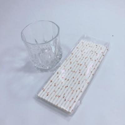 China Disposable High Quality Tanning Gold Striped Biodegradable Paper Straw for sale