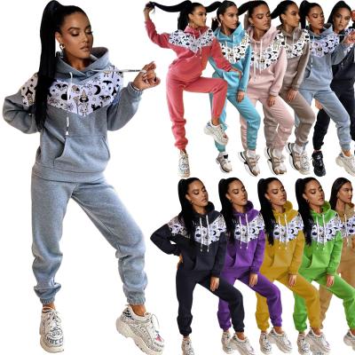 China New Arrival Women Clothing Graffiti Witch Cardboard Print Patchwork Waterproof Hoodies Waterproof Women Overalls Women Pants Two Piece Set for sale