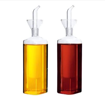 China Viable Hand Blown Glass Oil Dispenser Kitchen Condiment Serving Oil Dispenser Bottle with Pourers and Funnel for sale