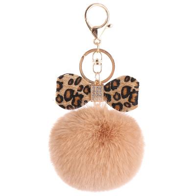 China Souvenir Item/Promotional Luxury Pom Pom Keychain Bulk Bow Handbags Rhinestone Blast Ball Keychains Luxury Leopard Brown Black Gifts for sale