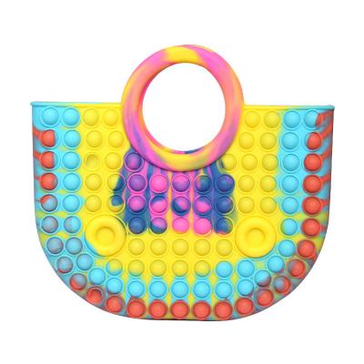 China 2021 New Silicone Xmas Gift Cute Busty Person Push Bubble Noise Handbag Toy Noise Squeeze Squeeze Bag for sale