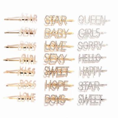 China Wholesale Korean Fashion Goods 2020 Gold Word Hair Pin Alphabet Hair Pin Letter Rhinestone Hair Clips Black Girls for sale