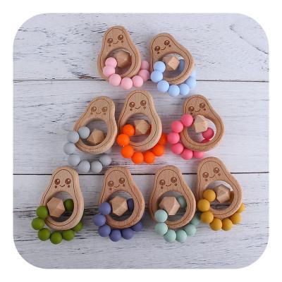 China Soft Toy Avocado Shape Baby Wooden Teething Ring Organic Chewable Silicone Beads Teething Bracelet for sale