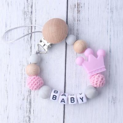 China BPA Free Silicone Crown Pacifier Holder Chain Soother Clip Baby Wooden Beads Pacifier Clip Free for sale