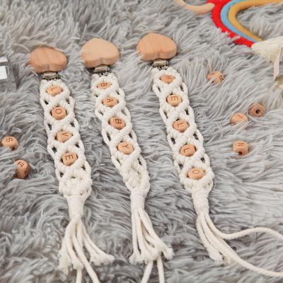 China BPA Free Hot Sale Macrame Woven Baby Pacifier Clip Wooden Letter Bead Teething Nipple Support Clip for sale