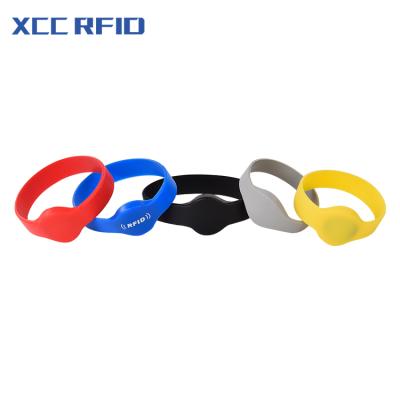 China Waterproof / Weatherproof XCC Low Cost Weatherproof 125KHZ / 13.56MHZ RFID Personalized 1 Inch Custom Rubber Wristbands No Minimum Silicone Wristband for sale