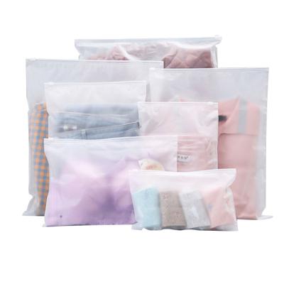 China Eco Friendly Recyclable Customize PVC Plastic Slider Transparent Zipper Bags Frosted Zip Lock Bags For Clothing for sale