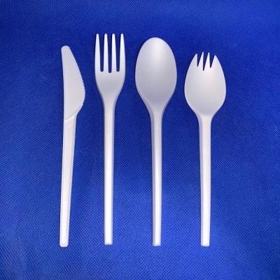 China Kraft Paper Box Packaging Sustainable Cpla Cornstarch Plastic Cutlery Set with Napkin for sale