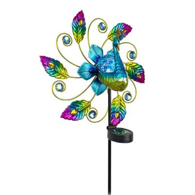 China Solar Powered Colorful Metal Peacock Ornament Double Stake Garden Wind Spinner Yard Kinetic Wind Spinner for sale