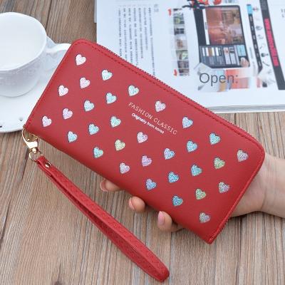 China 2021 New Waterproof Hollow Love Wallet Ladies Grasp Long Zipper Wallet for sale