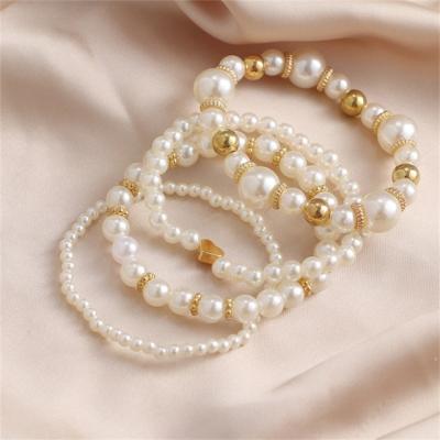 China Luxury Vintage Pearl 4pcs Charm Beads Jewelry Multi Layer Pearl Tennis Bangle Bracelet For Women for sale