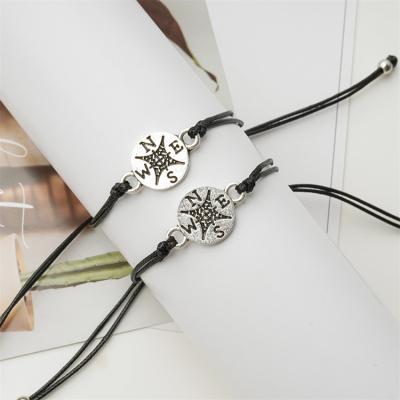 China Creative Casual/Sporting Alloy Wax Yarn Knitted Compass Map Adjustable Bracelet For Friends Girls Boys for sale