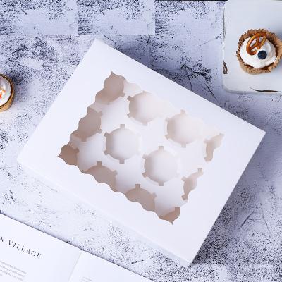 China Biodegradable Easy To Fold White Cake Packaging Muffin Box Cardboard Kraft Paper Box With Window 12 Hole Cupcake Box With Insert for sale