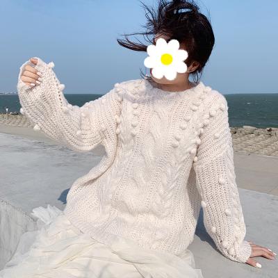 China Casual loose knit cable crewneck chunky oversized women's pullover slouchy sweater anti-shrink with pom poms for sale