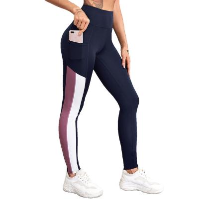 China Popular European and American Style Breathable Mesh Pants 3 Colors Sports Pants Show Slim Splice Design Long Cheap Yoga Pants for sale