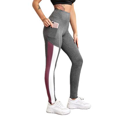 China Breathable Europe And The United States Can Be Customized Color High Waist Splicing Stretch Sports Pushing Wind Ladies Yoga Nine Point Pa for sale