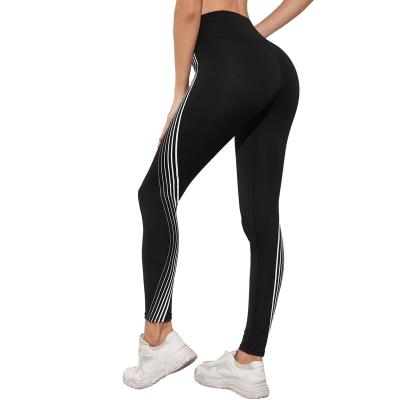 China 2022 Breathable White Black Printed Yoga Pants Sports Yoga Gaiters High Waist Simply Fit High Quality Long Pants Gaiters for sale