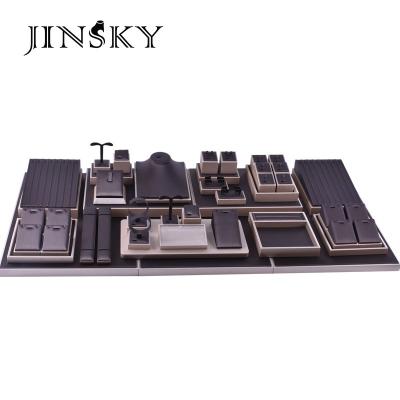 China Custom Jewelry Counter Display Wood And Leather Jewelry Display Sets Luxury Jewelry Display Stand for sale