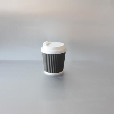 China Disposable Heat Proof Ripple Paper Disposable Coffee Cups With Plastic Lid for sale