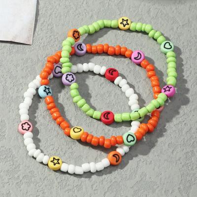 China Pure Handmade Handmade Elastic Rope Colorful Seed Bead Acrylic Crescent Moon And Star Charm Bohemian Bracelet Sets For Women for sale