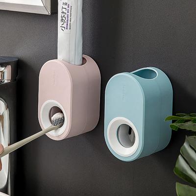 China Viable Toothpaste Dispenser Wall Mount Hanger Wall Mount Dustproof Non-Toxic Toothpaste Squeezer Quick Take Straw Rack for sale