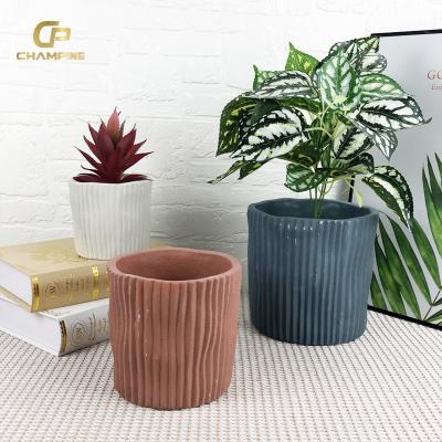 China Durable Nordic Style Bonsai Cement Flower Pots Vertical Strips Cylinder Creative Potted Plant for Concrete Pot for sale