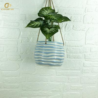 China Durable Unique Wavy grain Creative Design Garden Pots Planters Hanging Flower Pot Home balcony wall Decor Ceramic Hanging Pot for sale