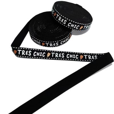 China Tela elástica de 20 mm con letras Impreso personalizado Banda elástica de nylon y látex en venta