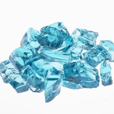 China Emerald Reflective Warm Colored Fire Stone Stocked Fire Stone Decorative Glass Icicles for sale