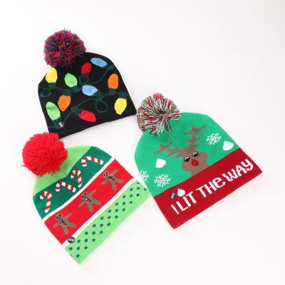 China 100pcs COMMON customized design logo LED knitted Christmas hat plain unisex cheap beanies solid pattern fashion design for sale