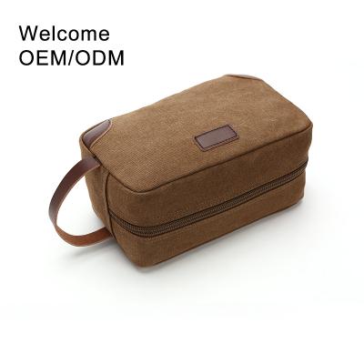 China Vintage Wholesale OEM ODM Private Label Make Up Canvas Travel Pouch New Style Custom Makeup Bag Cosmetic for sale