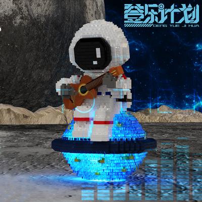 China Eco-friendly Material Astronaut Mini Building Blocks Micro Model KitsSpace Toys Led Lighting Outer Space Moon Astronauts Model for sale