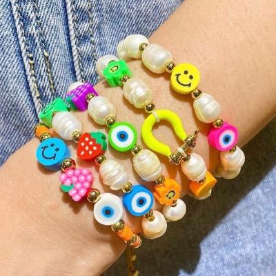 China Handmade Clay Polymer Beads Wholesale Fashion Fruit Bangle Eye Flower Sun Smile Copper Bead Bracelet For Women Gift Party for sale